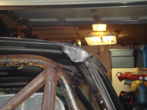 1989 Ford Escort - Roll cage installation in progress, showing the interior roof structure.