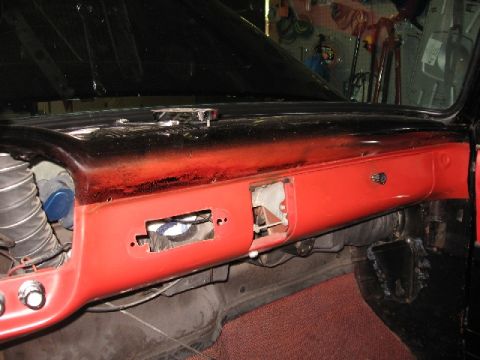 1966 Ford F-100 - The dashboard interior shows a red painted dash panel with openings for components.
