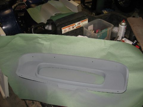 1966 Ford F-100 - A gray dashboard part, likely for a classic truck, is prepared for refinishing.