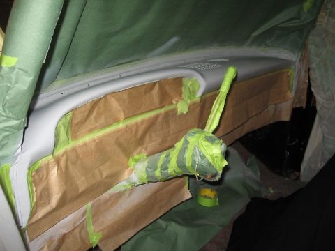 1966 Ford F-100 - The interior dashboard of a 1966 Ford F-100 is prepared for a repaint, with protective coverings in place.