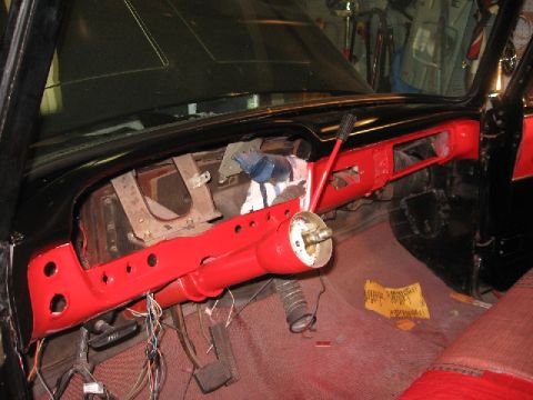 1966 Ford F-100 - Interior view of a 1966 Ford F-100 dashboard during restoration, showing exposed wiring and painted components.