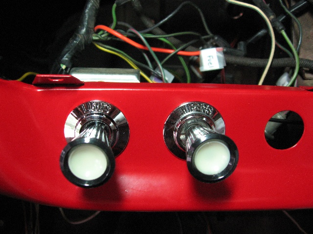 Dashboard with two chrome knobs labeled LIGHTS and WIPERS, plus wiring harness