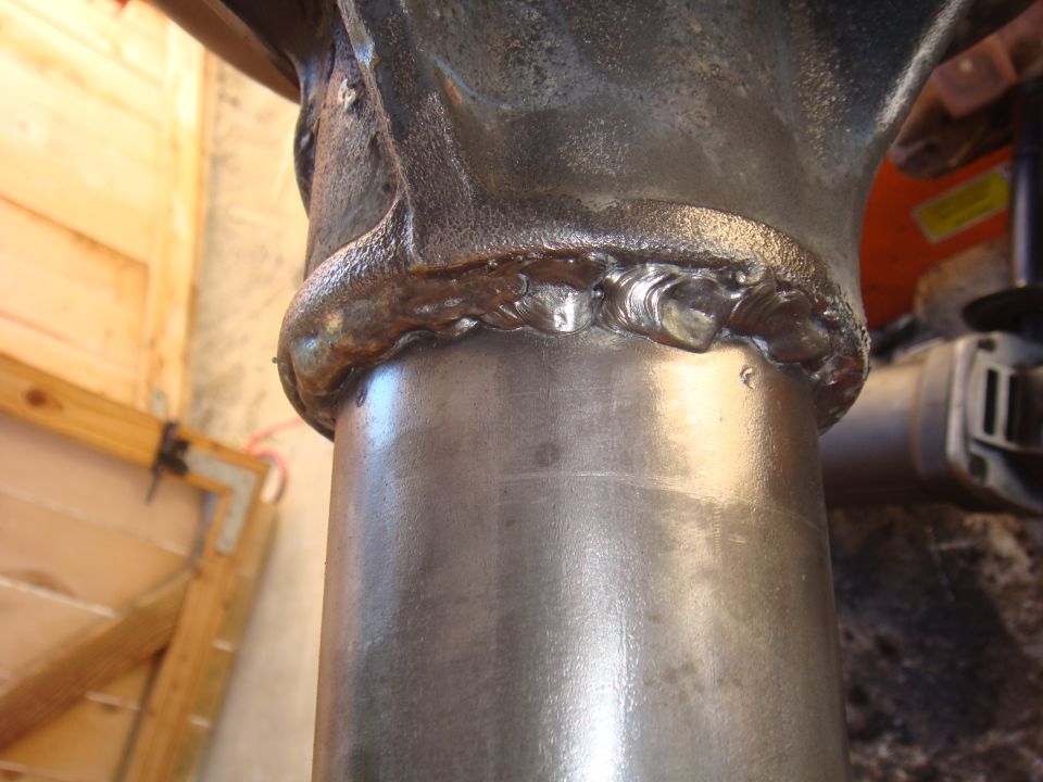 Close-up of a metal tube with a welded joint
