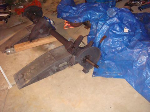 1992 Ford Bronco - Front axle assembly, likely for a truck or SUV, is shown disassembled and covered.