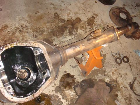 1992 Ford Bronco - Disassembled Ford Bronco rear axle assembly on jack stands, ready for rebuild.