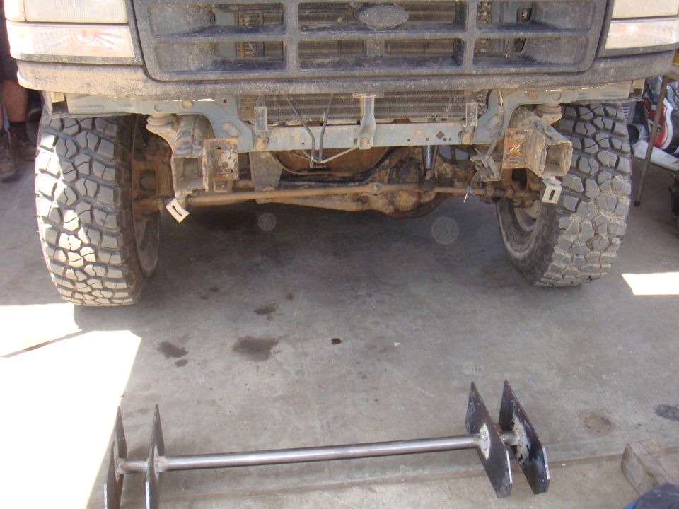 1992 Ford Bronco front end with off-road tires and exposed axle