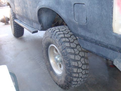 1992 Ford Bronco - Close-up of the rear wheel and fender flare on a 1992 Ford Bronco.