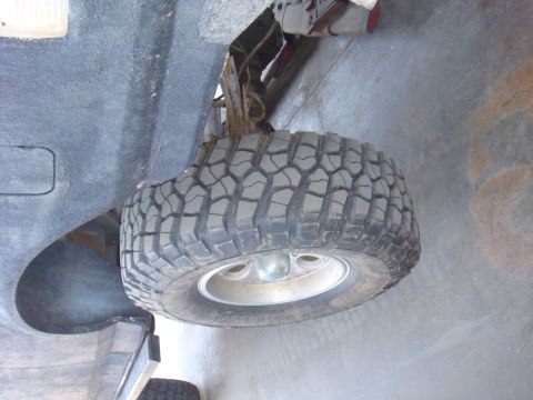1992 Ford Bronco - Underside view of a 1992 Ford Bronco's tire and fender well.