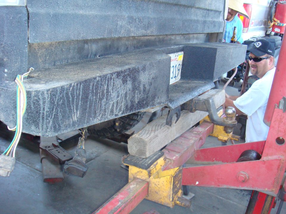 Rear bumper with trailer hitch and license plate 319