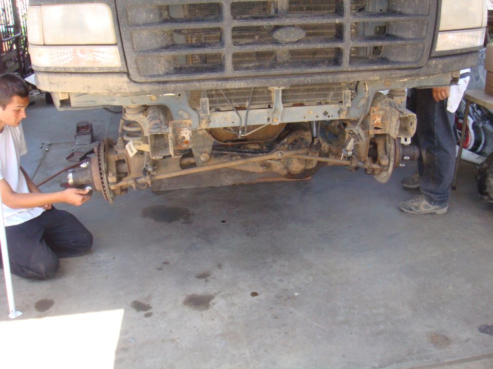 1992 Ford Bronco front axle and suspension during repair