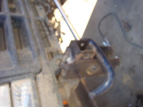 1992 Ford Bronco - A close-up view of a vehicle's interior components, possibly part of the dashboard or engine bay.