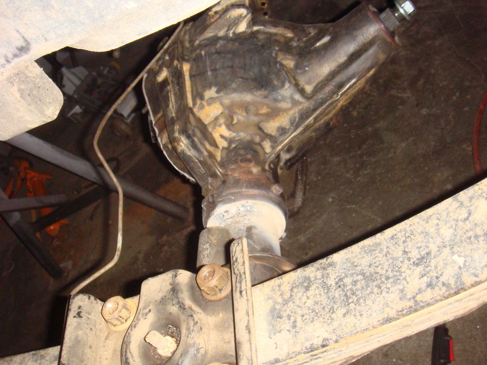 1992 Ford Bronco differential housing, rusty and dirty, viewed from below