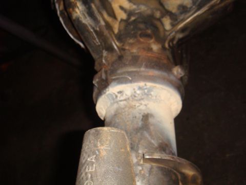 1992 Ford Bronco - Close-up view of a rear axle differential housing, showing some stamped markings.
