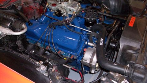 1973 Ford Ranchero - Close-up view of a blue Ford V8 engine, likely from a classic car or truck.