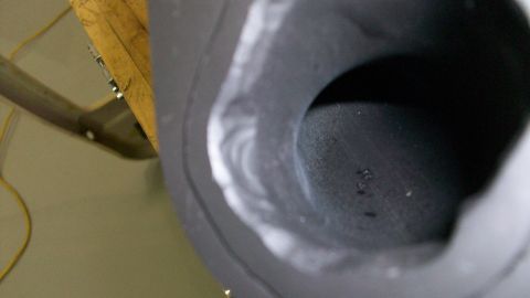 1973 Ford Ranchero - Intake port detail, likely from a V8 engine. The casting shows some imperfections.
