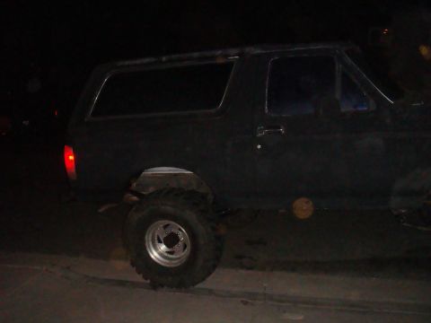 1992 Ford Bronco side view at night