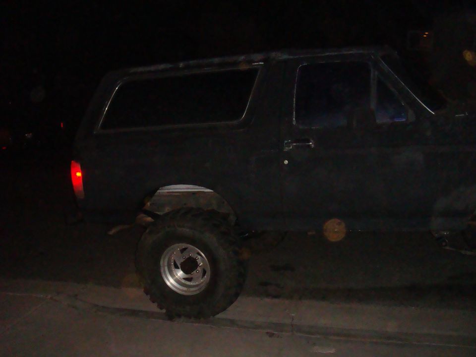 1992 Ford Bronco side view at night