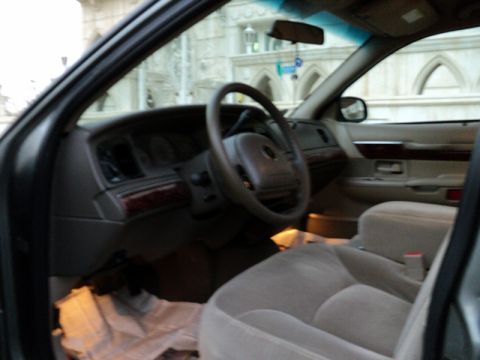 2001 Mercury Grand Marquis - Interior view of a 2001 Mercury Grand Marquis, highlighting the dashboard and seating.