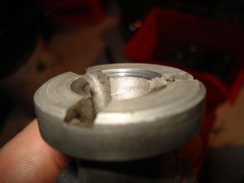 1967 Ford F-250 - Damaged distributor cap part, likely needing replacement for a vehicle rebuild.