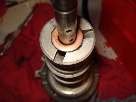1967 Ford F-250 - Distributor shaft and housing assembly, likely during a rebuild or repair process.