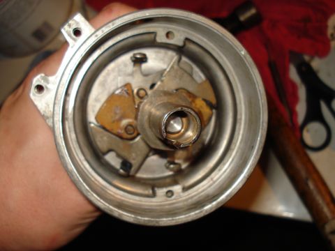 1967 Ford F-250 - Interior view of a vehicle's distributor cap, revealing internal components.