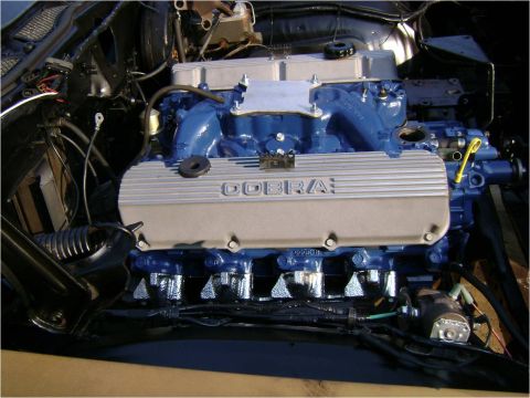 1972 Ford Ranchero - Close-up of a Ford Cobra engine, likely a performance upgrade part.