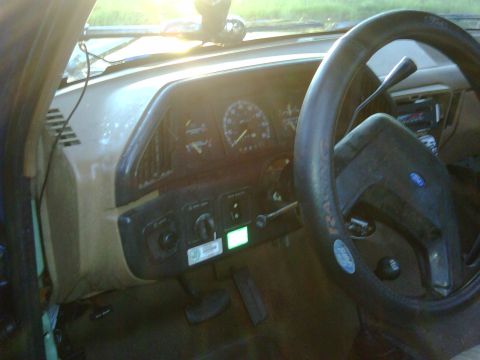 1991 Ford Bronco - Dashboard view of a 1991 Ford Bronco, showing the steering wheel and instrument cluster.