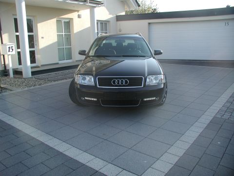 2003 Audi A6 - Front view of a black 2003 Audi A6 wagon parked on a paved driveway.