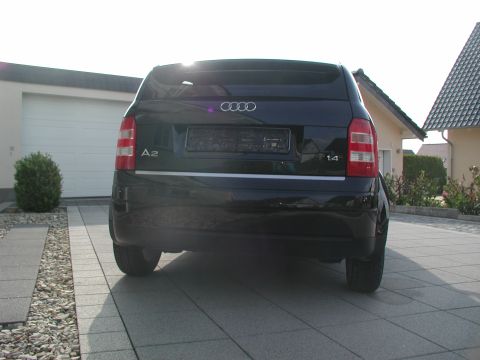 2001 Audi A4 - Rear view of a black Audi A2 with '1.4' badging, parked in a paved driveway.