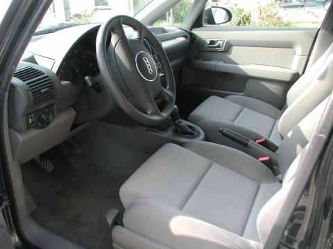 2001 Audi A4 - Interior view of a car, showing the dashboard, steering wheel, and seats.