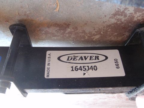 1994 Ford Bronco - Close-up of a Deaver leaf spring, part number 1645J40, manufactured in the USA.