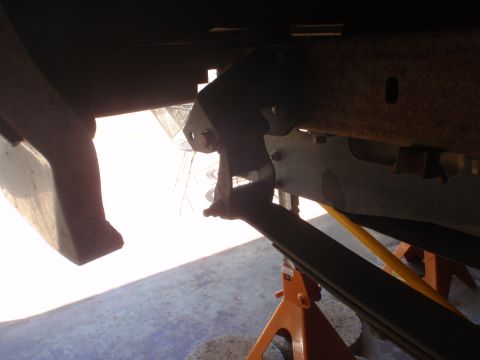1994 Ford Bronco - Vehicle suspension components are shown supported by jack stands.