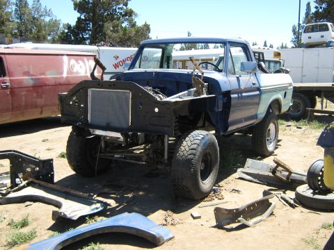 1978 Ford Bronco - This Ford F-Series truck is missing its front clip and appears to be undergoing repairs or is being dismantled.