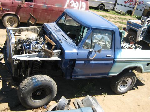 1978 Ford Bronco - This blue pickup truck appears to be a 1978 model, but it is not a Ford Bronco.