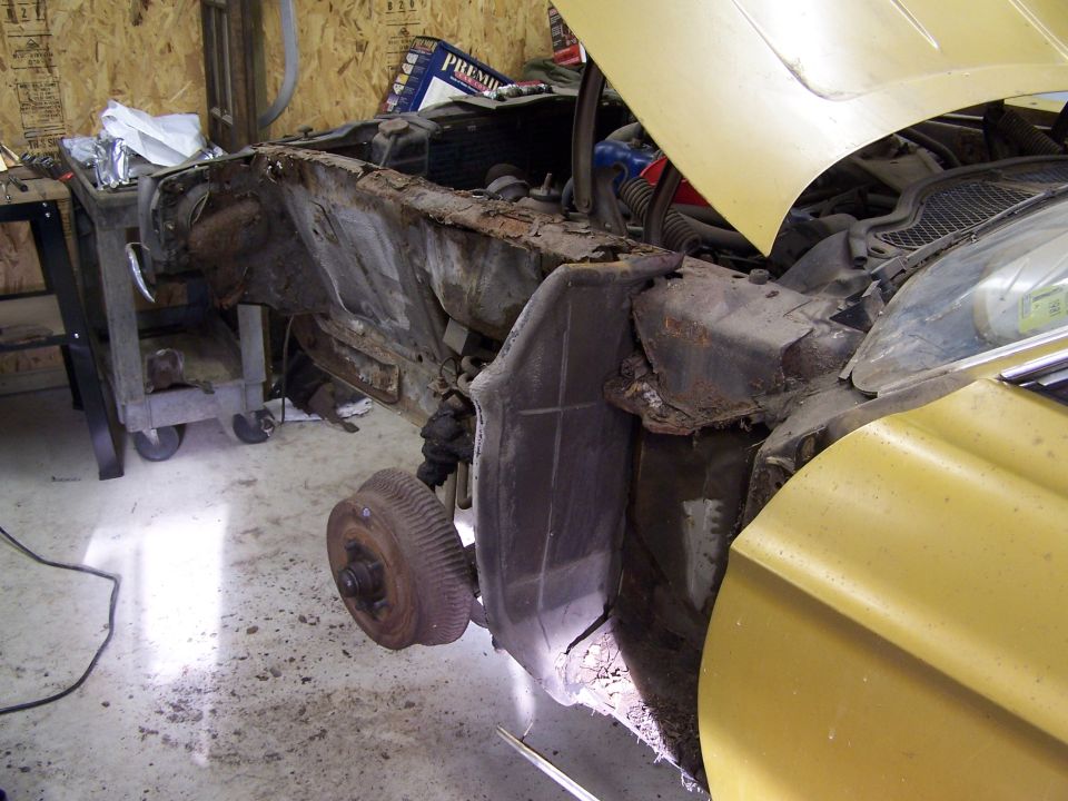 1972 Ford Mustang front clip, heavily rusted, with hood open