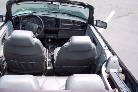 2001 Ford Crown Victoria - Interior view of a convertible, showing the dashboard, steering wheel, and seats.