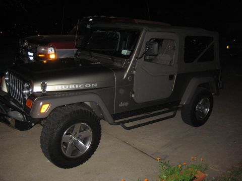 2005 Jeep Wrangler - 2005 Jeep Wrangler Rubicon with soft top and side steps.