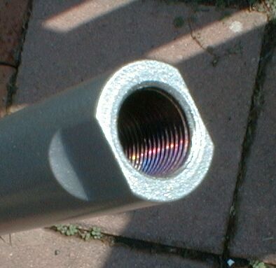1990 Ford Bronco - Close-up view of the threaded end of a metal tube, likely a steering component.