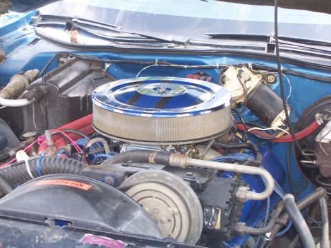1973 Ford Ranchero - Close-up view of a vehicle's engine bay, showing various components and wiring.