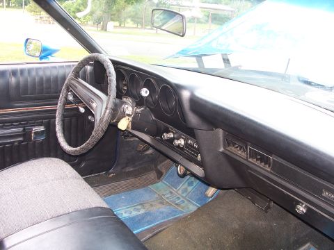 1973 Ford Ranchero - Interior view of a 1973 Ford Ranchero, highlighting the dashboard and driver's seat area.