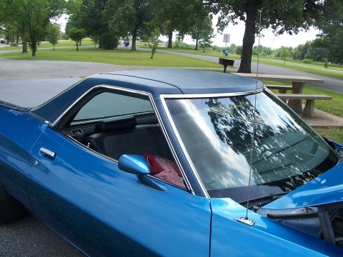1973 Ford Ranchero - A blue 1972 Ford Ranchero is parked outdoors near picnic tables and trees.