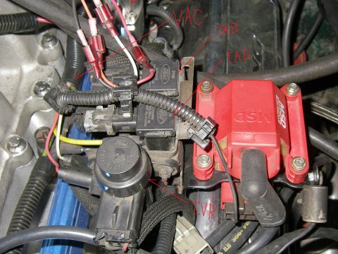 1990 Ford Bronco - Engine bay wiring and ignition components are visible, with some parts labeled by hand.