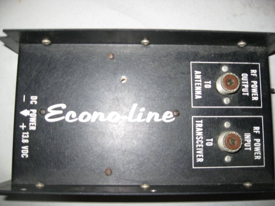 Black radio amplifier with 'Econo-line' logo and RF power input/output connectors