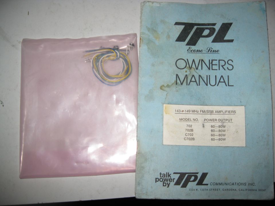 TPL Econo-Line Owners Manual and a plastic bag with wiring