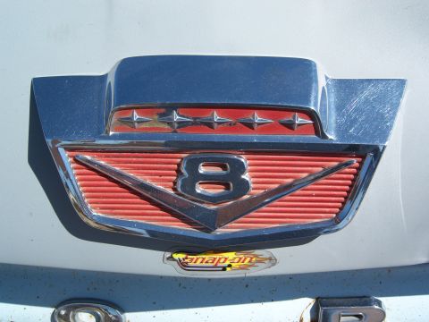 1963 Ford F-100 - Ford V8 emblem from a 1957 model, a V-shaped grille insert and five stars.
