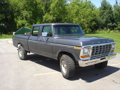 1979 Ford F-250 - This 1979 Ford F-250 crew cab pickup truck is shown from a three-quarter front angle.
