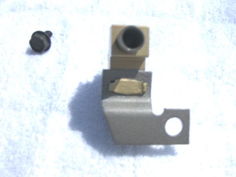 1970 Chevrolet Camaro - A metal bracket and a bolt are shown against a white background. The registry claims it is from a 1970 Chevrolet Camaro, but this is unconf…