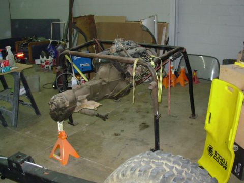 1983 Ford Bronco - The cage that was in the truck when he bought it is being used temporarily as an engine hoist. Only the transfer case is planned to go back…