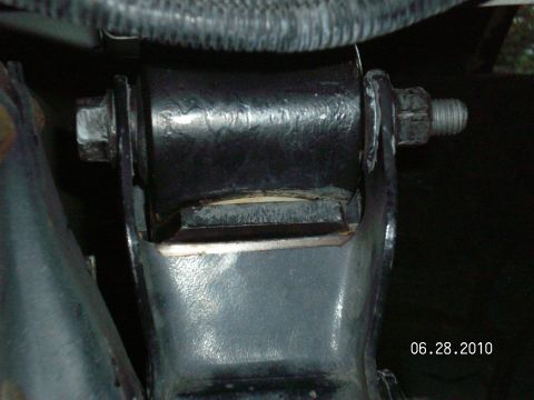1996 Ford Bronco - A close-up view of a driveshaft mount bracket, with a date stamp of 06.28.2010 visible.