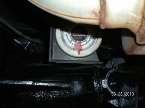 1996 Ford Bronco - A magnetic angle gauge is used to measure the driveshaft angle on a vehicle's differential housing.